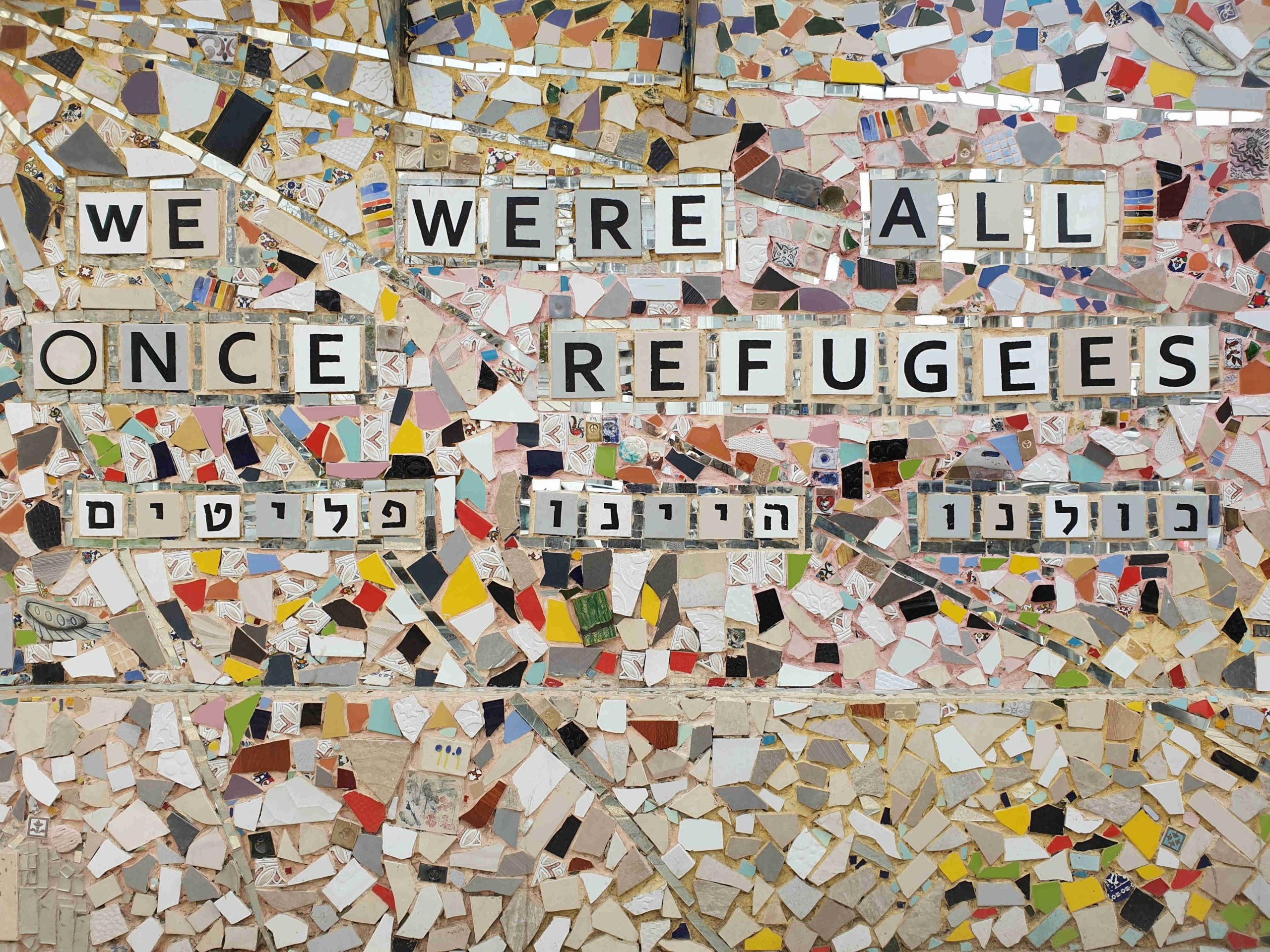 Mosaic reading We Were All Once Refugees