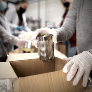 A Foodbank parcel being packed up at a warehouse
