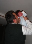 Iraqi man with his British born baby