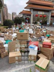 undelivered packages outside apartments in Shenzhen tns 