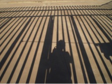 Detainees behind bar fences at Ponte Galeria, Rome’s Center for Identification and Expulsion (Photo: F. Esposito)